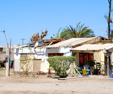 Damaged houses at Puerto Lopez Mateos 1.