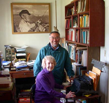 Photo of Western Outdoor News Baja editor Gene Kira with Carla Laemmle, in Ray Cannon's study.