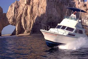 Photo of sportfishing cruiser at the arch, Cabo San Lucas, Baja California Sur, Mexico.
