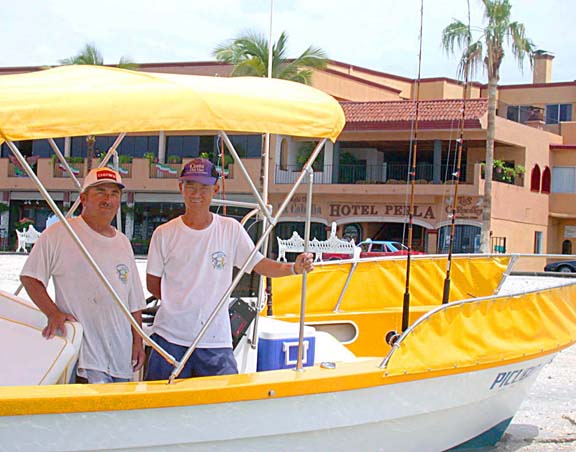 Photo of Mosquito Fleet sportfishing panga on beach at the Hotel Perla, La Paz, Mexico.