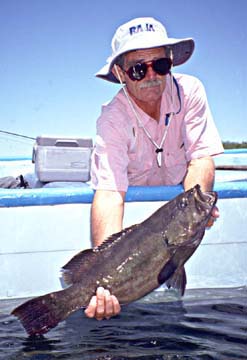 Photo of Gary Graham with grouper at Magdalena Bay, Mexico.
