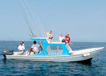 Kids on fishing boat Gitana at Ixtapa, Mexico.